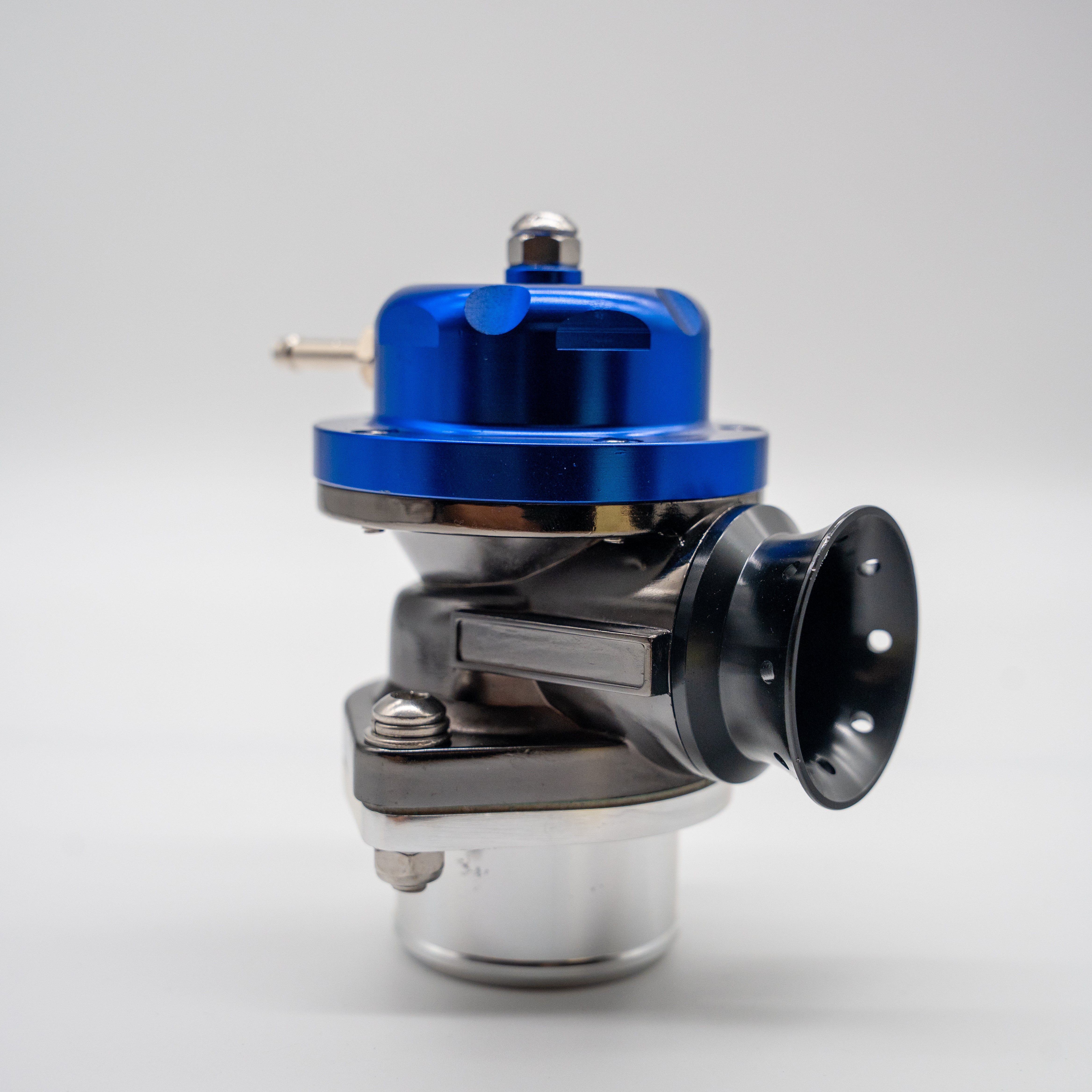 A high-performance automotive tuning component, likely a Blow off valve, featuring a glossy blue anodized top cap, a black venturi-style nozzle, and a polished silver aluminum base, photographed on a seamless light gray background.