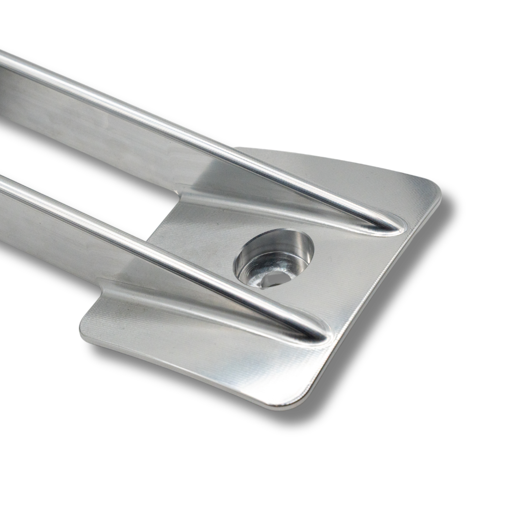 Close-up of the WR250 Signature Series billet aluminum intake grate showing the machined top loader wing and countersunk mounting hole