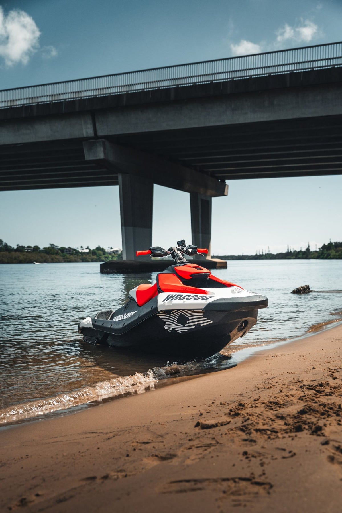 WORX Sea-Doo Spark Trixx on the beach under a bridge