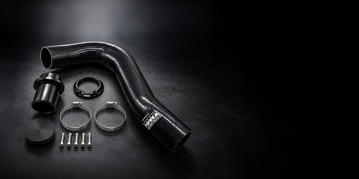 Contents of the WORX 2021 to 2023 Sea-Doo RXP-X 300 rear exhaust kit: silicone hose, outlet, dress ring, block-off cap, two hose clamps and six stainless bolts